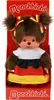 A Monchhichi doll dressed in a German-themed outfit, presented in its retail packaging. Náhled obrázku produktu