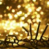 A close-up view of a string of warm white LED lights, with a bokeh effect of more lights in the background. Náhľad obrázku produktu