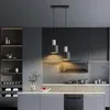 A modern kitchen interior with sleek cabinetry and pendant lights. Produktbild-Vorschau
