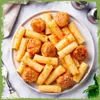 A plate of pasta with meatballs on a marble surface. Produktbild-Vorschau