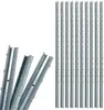 A collection of metal fence posts, some grouped together in the foreground and a larger group standing vertically in the background, all on a white background. Produktbild-Vorschau