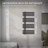 A modern bathroom setting with a radiator on the wall. Náhľad obrázku produktu