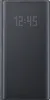 A black Samsung Galaxy Note 10 flip case with a digital clock displayed on the front. Produktbild-Vorschau