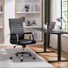 An office setting with a desk, chair, and shelves. Produktbild-Vorschau