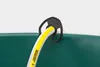 A close-up of a Kärcher SH 5 suction hose attached to a green bucket with a black hose holder. Anteprima dell’immagine prodotto