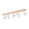 A white track light fixture with five adjustable spotlights mounted on a wooden bar, set against a white background. Produktbild-Vorschau