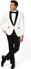A man wearing a white tuxedo with black lapels and a black bow tie, posing against a white background. Produktbild-Vorschau