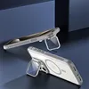 Two phone cases with integrated stands are displayed on a dark blue surface. Produktbild-Vorschau