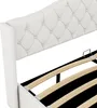 A close-up view of a white upholstered bed frame with a tufted headboard and wooden slats. Produktbild-Vorschau