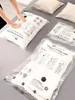 A person is shown pressing down on a vacuum storage bag on a bed, with other vacuum bags and pillows visible. Náhled obrázku produktu