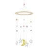 A baby mobile hanging from a string, with wooden beads, stars, a moon, and rings. Produktbild-Vorschau