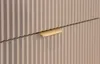 A close-up view of a ribbed cabinet front with a gold-colored metal handle partially pulled out. Náhľad obrázku produktu