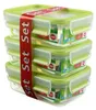 A stack of three clear glass food storage containers with green lids, bound together by a red ribbon with white text. Náhľad obrázku produktu