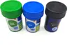 Three small paint pots with colored lids and labels, arranged diagonally on a white surface. Produktbild-Vorschau