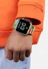 A child's arm wearing a Minecraft-themed digital watch. Produktbild-Vorschau