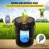 A hydroponic growing system set up outdoors with a grassy field in the background. Anteprima dell’immagine prodotto