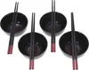 Four black ceramic bowls with chopsticks on a white background. Náhled obrázku produktu