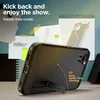 A black phone case with a kickstand is shown in a hands-free viewing mode, with text overlays highlighting its features. Produktbild-Vorschau