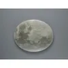 A circular lamp designed to look like the moon, set against a plain gray background. Náhled obrázku produktu