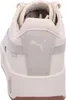 The back view of a beige Puma sneaker. Produktbild-Vorschau
