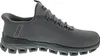 A side view of a gray Skechers slip-on shoe against a white background. Produktbild-Vorschau