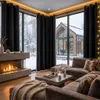 A cozy living room with a fireplace and large windows overlooking a snowy landscape. Anteprima dell’immagine prodotto