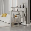 A modern living room with a white sofa and a bookshelf room divider. Produktbild-Vorschau