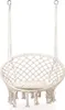 A white macrame hammock chair with a cushion, suspended by ropes. Náhled obrázku produktu
