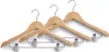 Three wooden hangers with metal clips against a white background. Produktbild-Vorschau