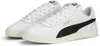 A pair of white Puma sneakers with black and gold accents, shown from a slightly elevated side angle on a white background. Náhled obrázku produktu