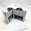 Two boxes of Dyson air purifiers are shown, wrapped in plastic, with a manual in the foreground. Voir les images du produit