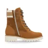 A single brown lace-up boot with a white sole and a striped cuff, shown from the side against a white background. Produktbild-Vorschau