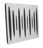 A white acoustic wall panel with black, irregular vertical cutouts, shown at an angle against a white background. Podgląd zdjęcia produktu
