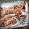 A family and their dog sleeping in a bed. Produktbild-Vorschau