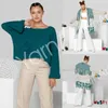A collage of three images showing a woman modeling a teal sweater and a cardigan with white pants. Anteprima dell’immagine prodotto