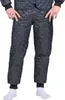 A person wearing quilted blue trousers and white socks. Produktbild-Vorschau