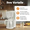 A coffee maker with a thermal carafe is shown on a wooden table, with kitchen cabinets in the background. Overlay text highlights product benefits. Anteprima dell’immagine prodotto