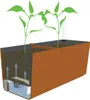 Diagram showing a self-watering planter box with plants and water flow. Náhled obrázku produktu