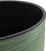 A close-up view of the top rim and textured exterior of a green pot. Voir les images du produit