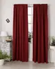 A room interior with a window covered by dark red curtains. Produktbild-Vorschau