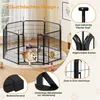 A dog pen set up indoors with a dog inside. Produktbild-Vorschau