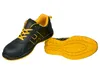 A pair of black and yellow safety shoes, with one shoe shown from the side and the other from the sole. Produktbild-Vorschau