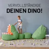 A child playing with a dinosaur-themed beanbag set. Anteprima dell’immagine prodotto