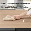 A hand is wiping a wooden table with a cloth, and there are icons and text indicating features. Produktbild-Vorschau