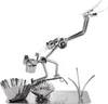 A metal sculpture of a diver collecting shells, made from recycled parts like a spark plug and nuts. Podgląd zdjęcia produktu
