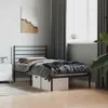 A bedroom scene with a bed, nightstand, and artwork. Podgląd zdjęcia produktu