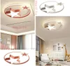 A collage of images showing a star-shaped ceiling light fixture for a child's room, including close-ups and a lifestyle shot of a nursery. Náhled obrázku produktu