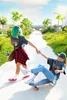 Two young women with skateboards on a path. Anteprima dell’immagine prodotto