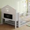 A white children's bed with a house-shaped headboard and a chalkboard panel. Anteprima dell’immagine prodotto