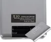 Close-up view of the back of a digital scale, showing the open battery compartment and a label with product information. Produktbild-Vorschau
